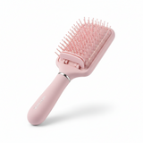 Brosse auto-nettoyante rose pastel